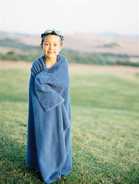 Boy Drying Off In A Towel By Stocksy Contributor Kirstin Mckee