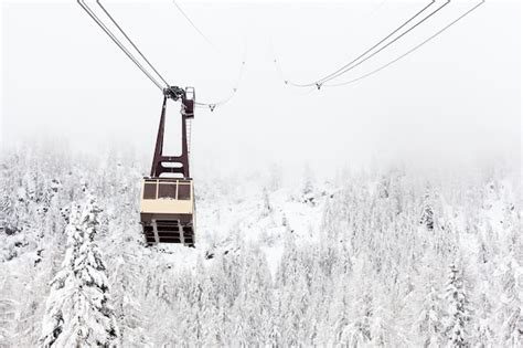 Premium Photo | Cable car in the snowy landscape