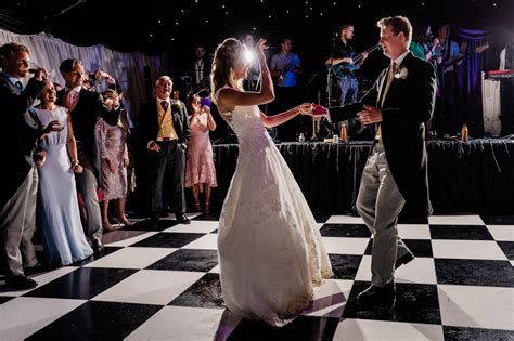 Black And White Dance Floor At A Wedding Marquee With A Stage Perfect