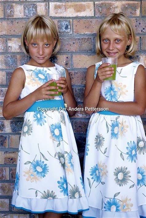 Afrikaner Twin Girls Drink Lemonade After Church Service In Orania