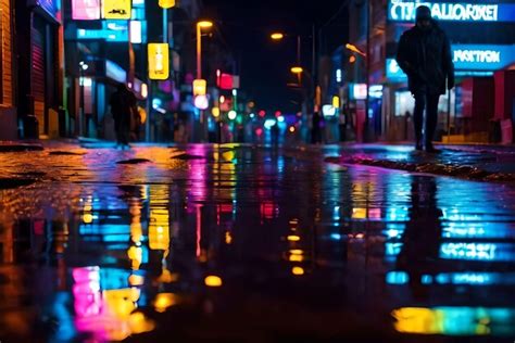 Premium Photo Neon Lights Reflected In Puddles Of Water A Street