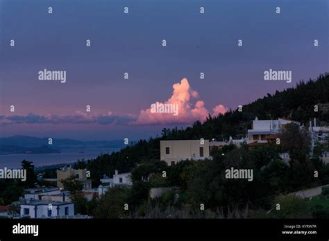 Little Pink Cloud During The Sunset Above A Traditional House At Zia