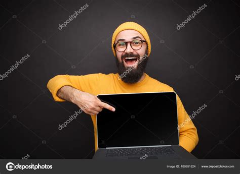 Smiling Man Pointing At Laptop Stock Photo By Kegfire