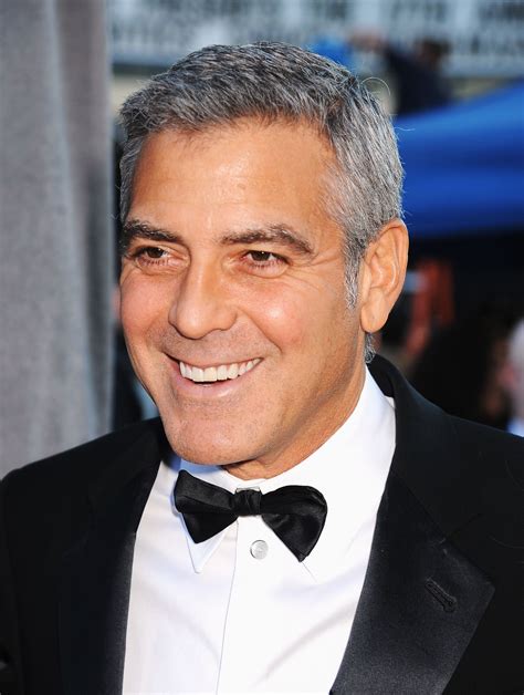 George Clooney wore a tux and a big smile to the 2012 Critics' Choice ...