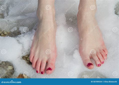 Barefoot in the snow stock photo. Image of freezing, ankle - 50789554