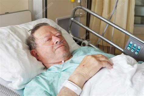 Senior Man In Hospital Bed Stock Photo Mirage