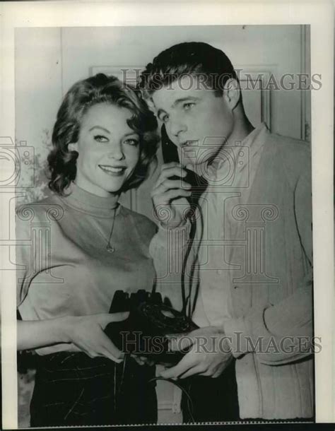 1961 Press Photo Actor David Nelson Speaks On Phone While June Blair