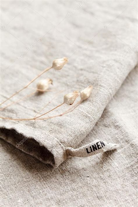 Linen fabric with dry linen plant Stock Photo by ©Shebeko 68807393