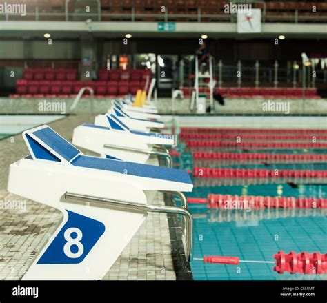 Olympic Swimming Pool starting blocks Stock Photo - Alamy