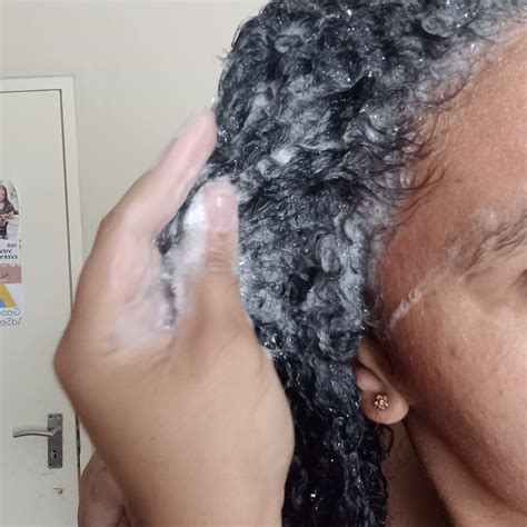 Why Does My Hair Feel Waxy & Sticky After Washing? – The Curly Hair Journey