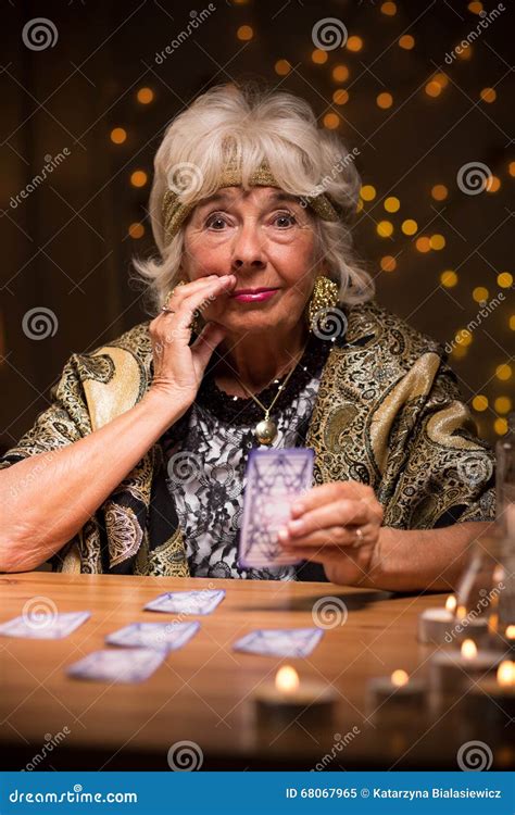 Eccentric Elderly Lady With Cards Royalty Free Stock Photography