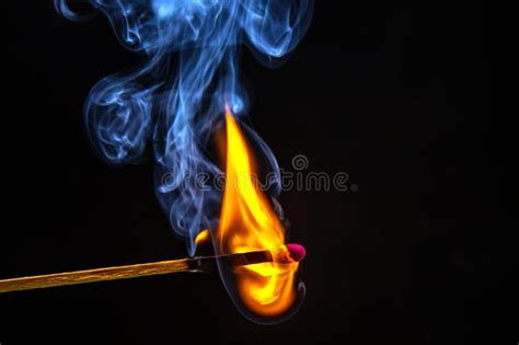 Fire And Smoke Burning And Smoking Match On A Black Background Stock