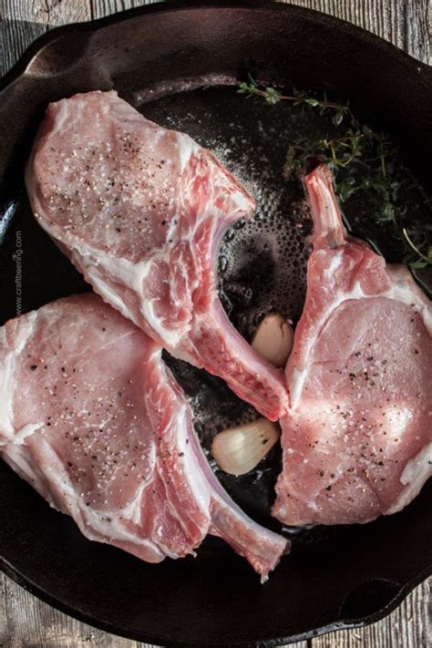 Cast Iron Skillet Pork Chops Seasoned With Salt And Pepper And Cooked In Butter And Olive Oil