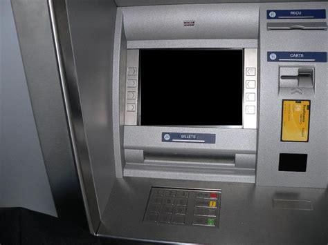 Guichet automatique bancaire Matériel et logiciel