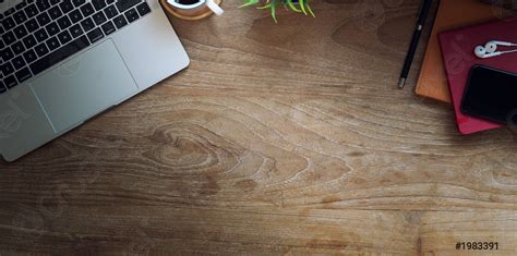 Wooden office table with laptop and copy space - stock photo 1983391 | Crushpixel