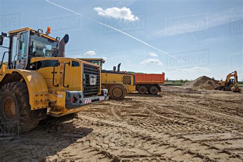 Construction Vehicles On Work Site Stock Photo Dissolve