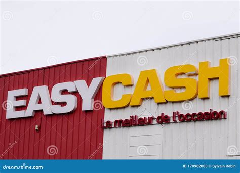 Easy Cash Logo On Store Front On Blue Sky Background Easy Cash Is The