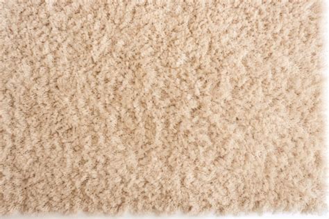 Premium AI Image Elegant Overhead Snapshot Stylish Soft Beige Carpet