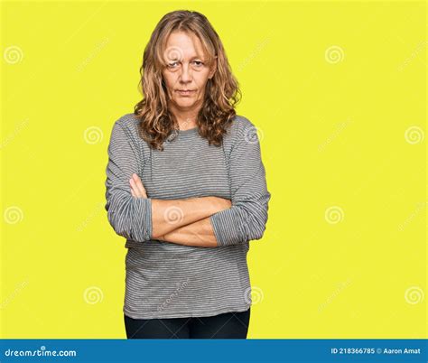 Middle Age Blonde Woman Wearing Casual Clothes Skeptic And Nervous Disapproving Expression On
