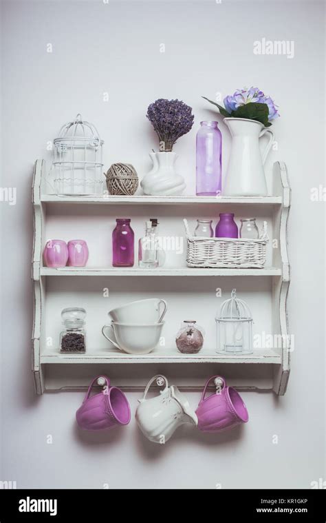 Vintage shelf on wall Stock Photo - Alamy