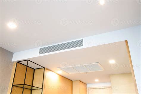 Ceiling Mounted Cassette Type Air Conditioner And Modern Lamp Light On