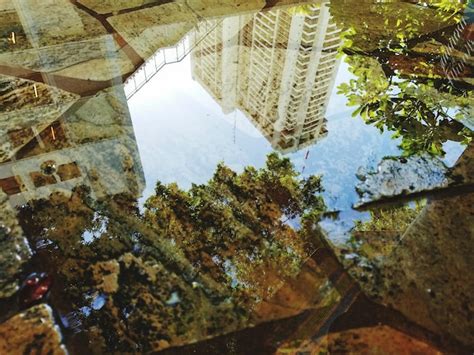 Premium Photo Reflection Of Built Structure In Water