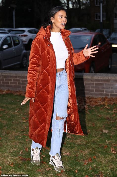 Maya Jama cuts casually chic figure in ripped jeans and velvet padded ...