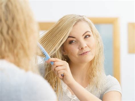 Woman Brushing Her Wet Blonde Hair Stock Image Image Of Young