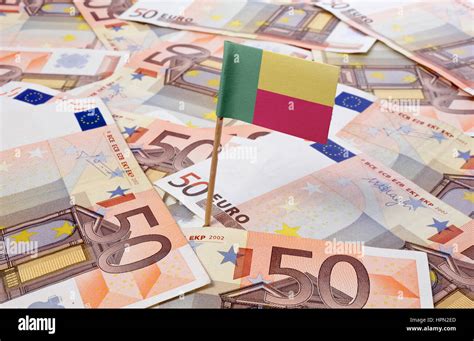 Flag of Benin sticking in european banknotes.(series Stock Photo - Alamy