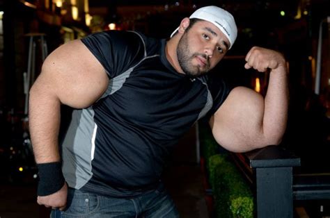 Egyptian Bodybuilder Has The Biggest Biceps In The World 12 Pics