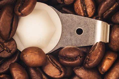 Roasted Coffee Beans Are Ground In A Coffee Grinder Stock Image Image