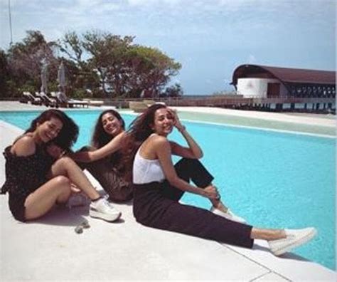 Malaika Arora Chills In Bikini Scorches In Fiery Red Dress In The Maldives See Pics