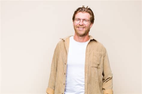 Premium Photo Blonde Adult Blonde Man Wearing Glasses Isolated