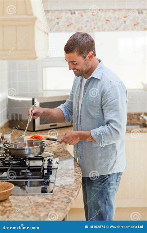 Handsome Man Cooking In The Kitchen Stock Photo Image Of Nutrition