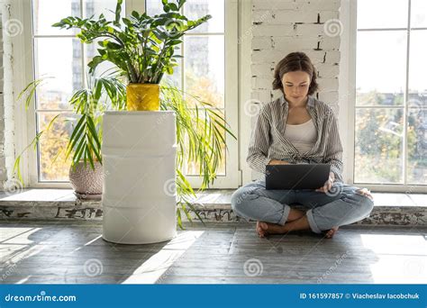 Young Woman Sitting On The Window Sill Stock Image Image Of Alone