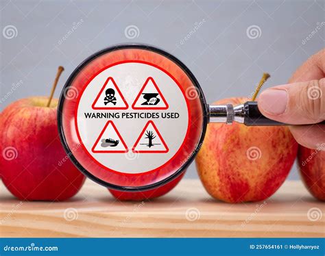 Magnified Label On Apple Warning Of Environmental Damage Caused By