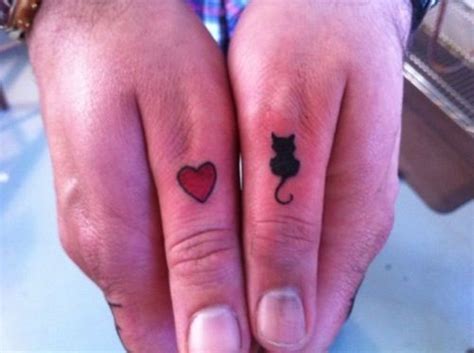 28 Elegant Cat Finger Tattoos