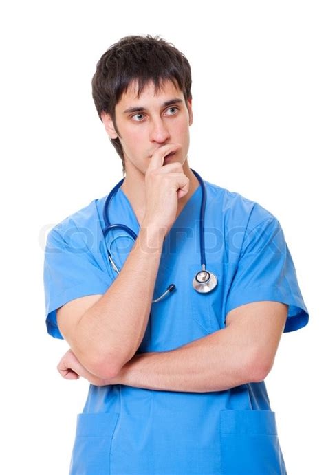 Portrait Of Pensive Doctor In Blue Stock Image Colourbox