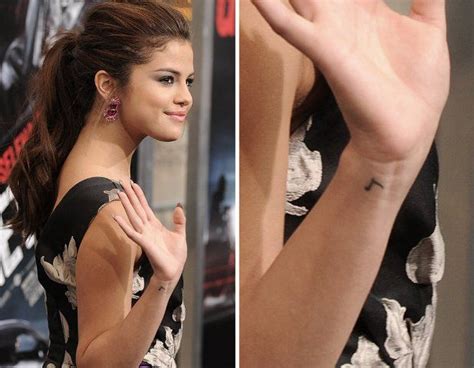 Selena Gomez S Tattoos Their Meanings Body Art Guru