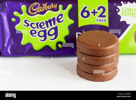 Pile Of Cadbury Screme Egg Biscuits For Halloween In Front Of Packet