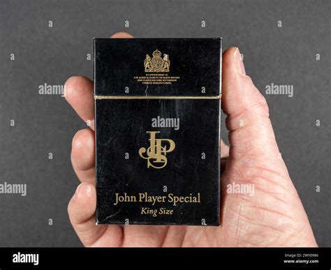 Man Holding An Original Empty Packet Of 20 John Player Special JPS