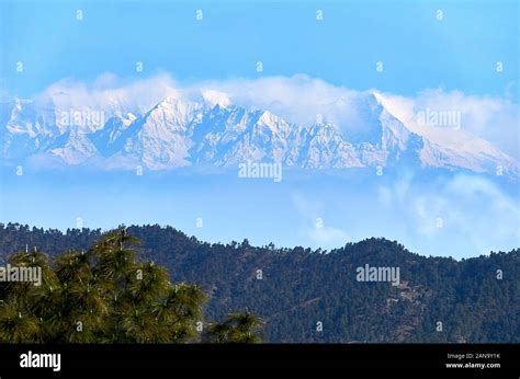 Distant view of the snow capped Indian Himalayas around Nanda Devi ...