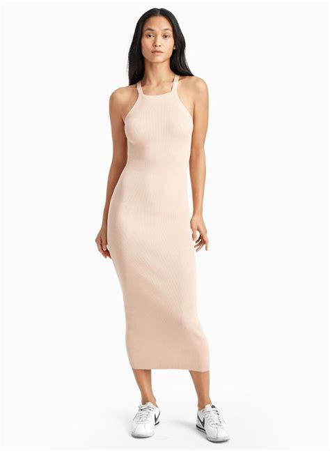 A Body Hugging Dress Thats Confident On Its Own But Easily Layered