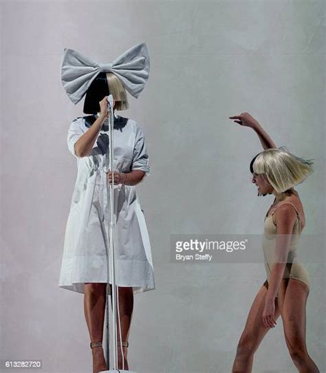 Recording artist Sia and dancer Maddie Ziegler perform during a stop ...