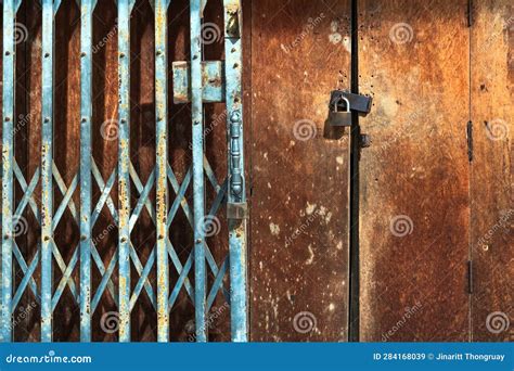 Locked Old Damaged Wooden Doors Royalty Free Stock Photography