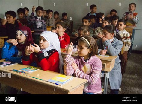 Children Attend Class At A Newly Opened School In Aleppo Syria Stock