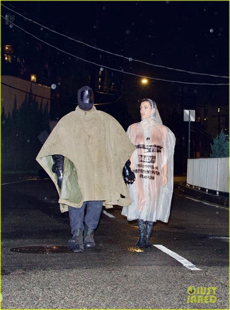 Kanye Wests Wife Bianca Censori Braves The Rain In See Through Poncho With Nothing Underneath