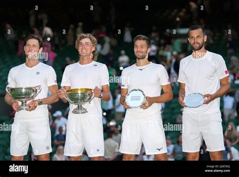 Matthew Ebden Left Of Australia And Partner Max Purcell Second Left