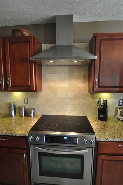 New Venetian Gold Granite Countertop With Tile Backsplash