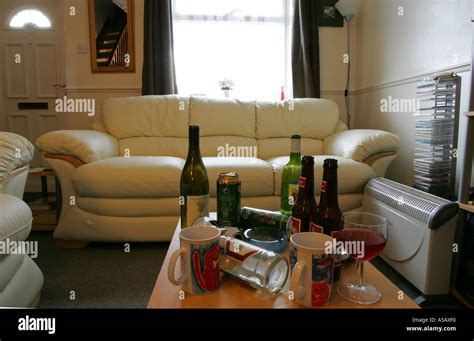 British living room after a small house party the morning after the night before Stock Photo - Alamy